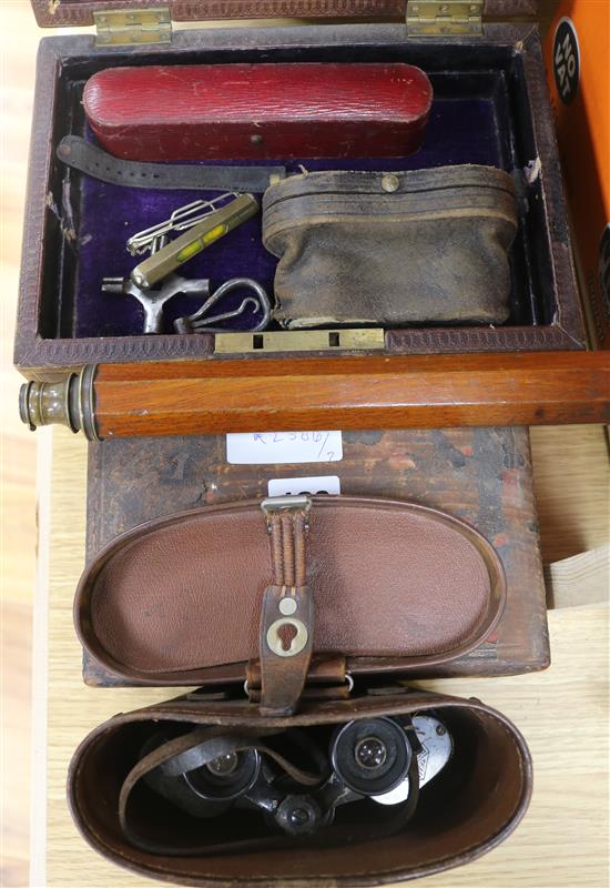 A telescope, binoculars, leather box etc